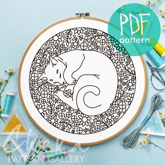 A cute cat sleeping in flowers. Sleeping cat, embroidery pattern. Digital pattern for hand embroidery. Portrait of a cat, cat lover gift